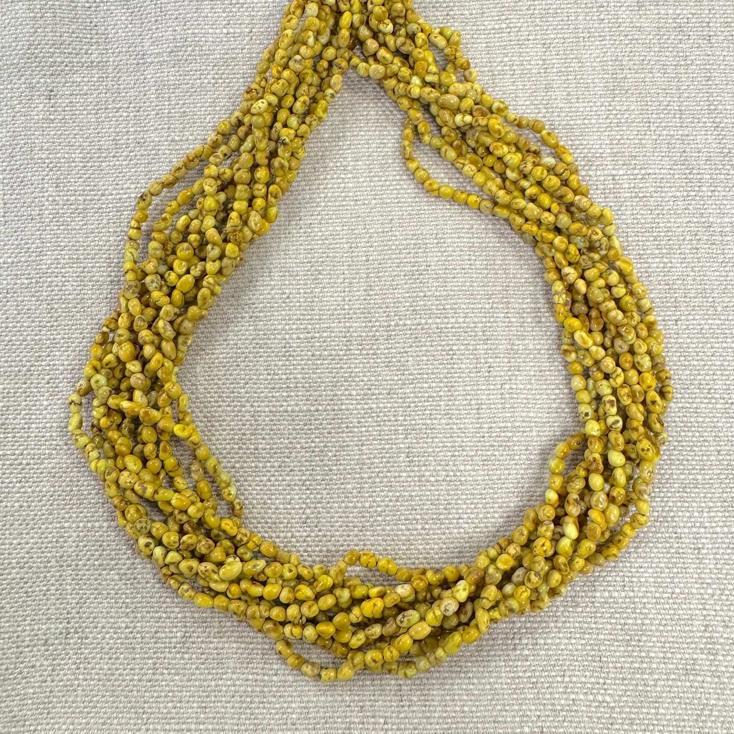 Palomino Smooth Flat Bead Strand -- Approx 3.5mm, 18"