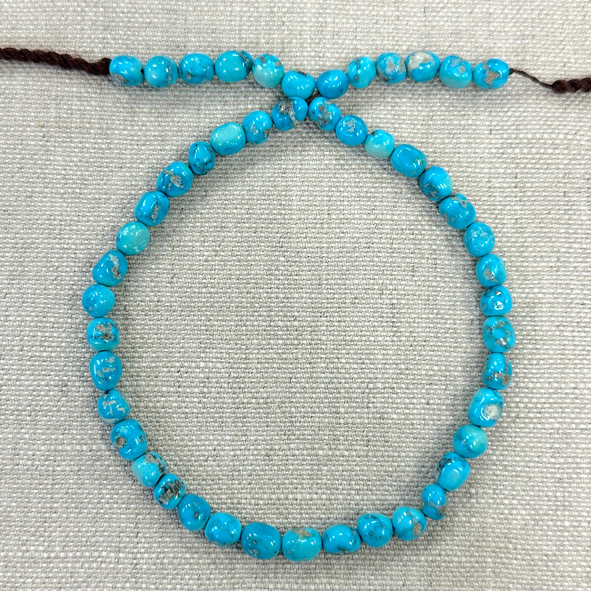 Bluebird 7.5mm Smooth Nugget Beads -- 16" strand