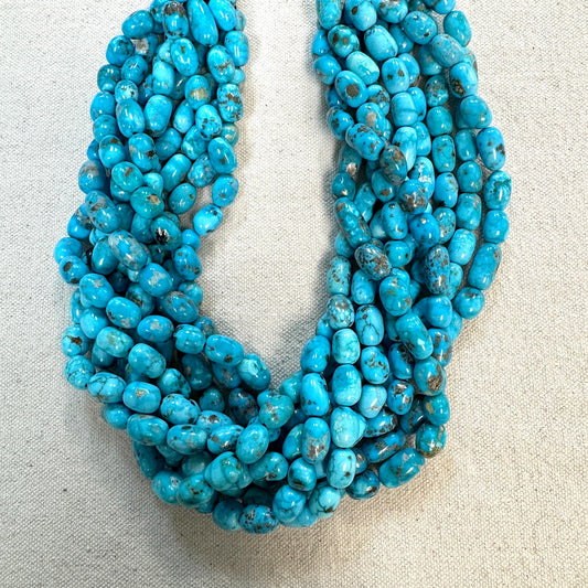Bluebird Turquoise Free Form Smooth Nugget 16" Strand Barrel width 8mm to 8.5mm