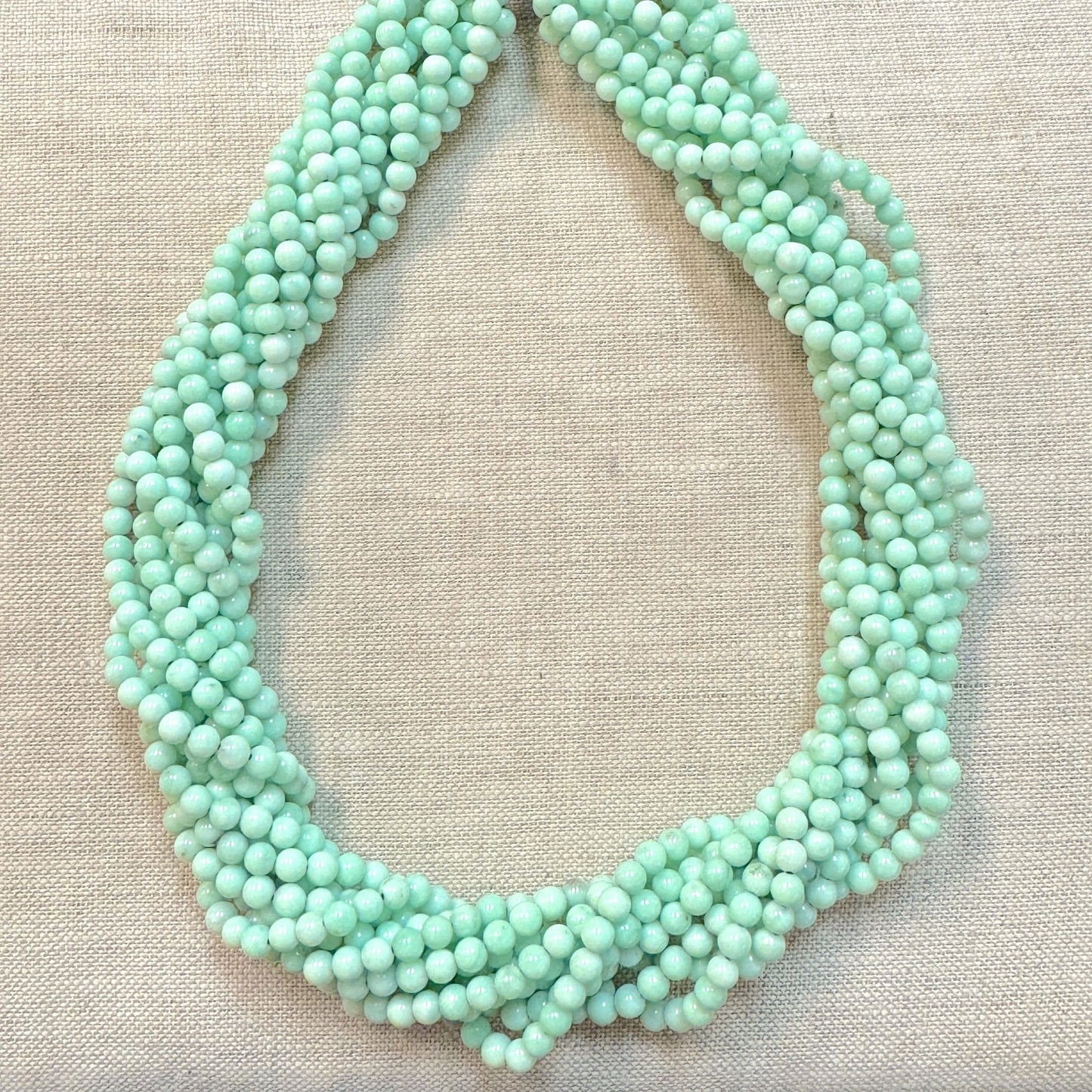 Paloma 4.5 mm Calibrated Round Beads -- 18" strand