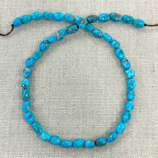 Bluebird 6.7-7mm Smooth Nugget Beads -- 16" strand