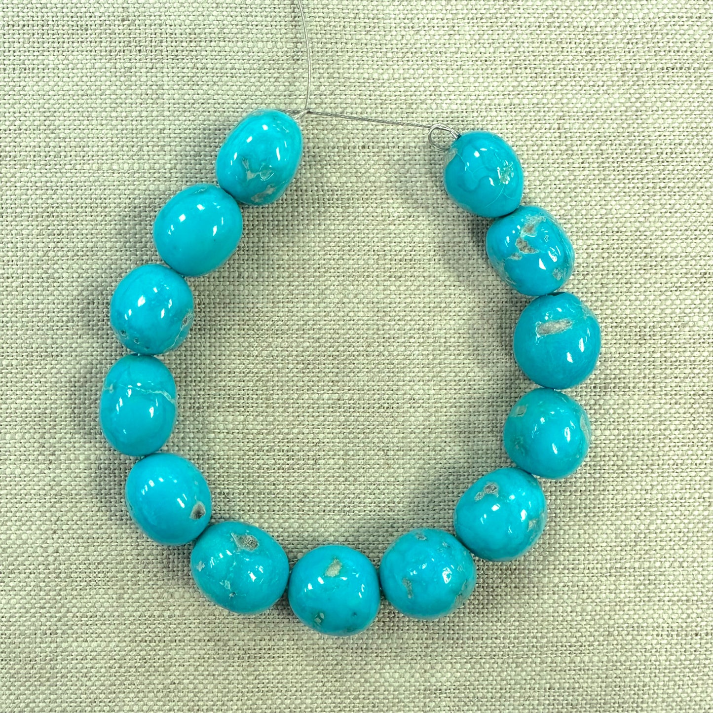Bluebird 11.3- 12.8 mm Beads -- 7" strand
